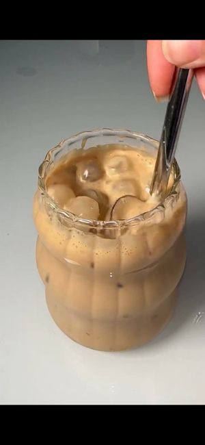 Iced Honey Latte Stirring Close-up