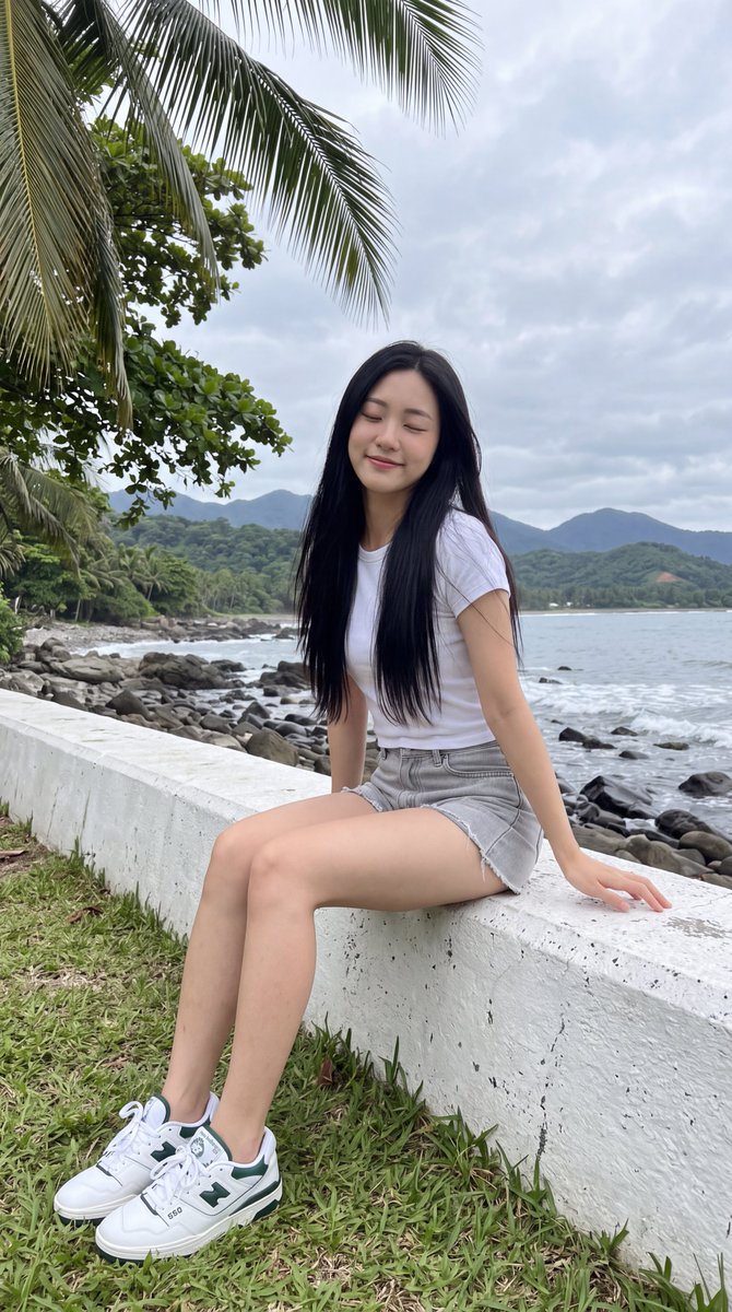 East Asian Woman on Sea Wall