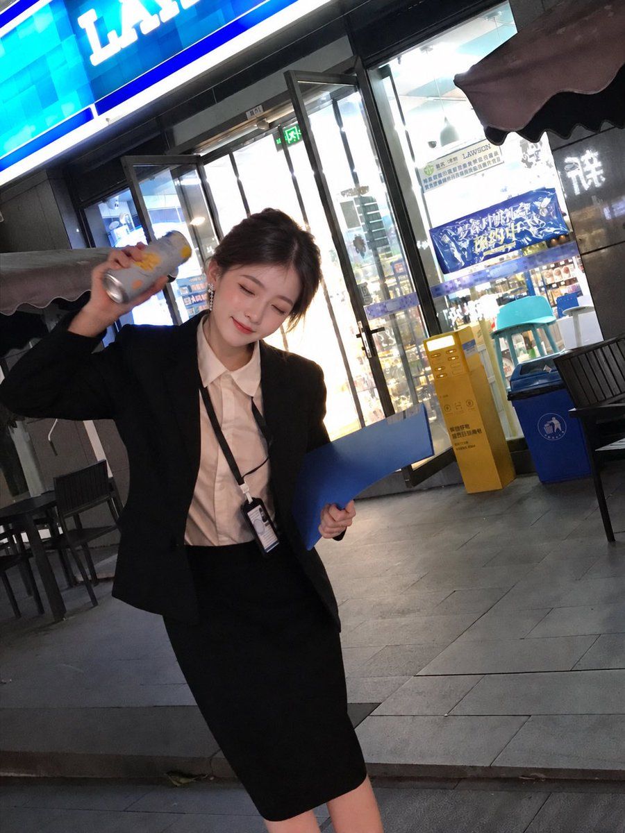Tipsy Office Woman Outside a Convenience Store