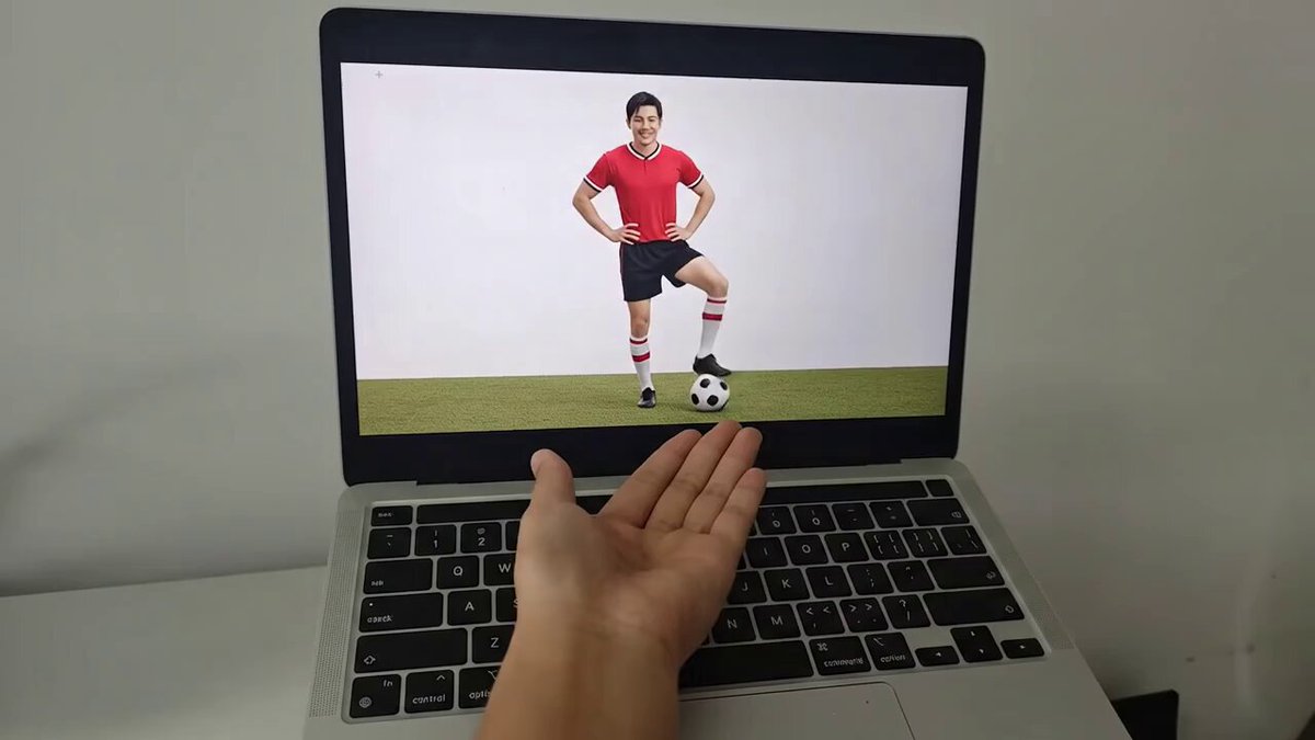 Soccer Player Jumping Out of Screen